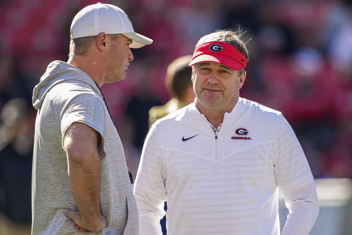 Georgia Tech interim head coach Brent Key and Georgia head coach Kirby Smart